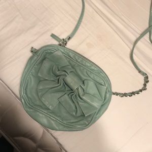 Candies teal bow cross body
